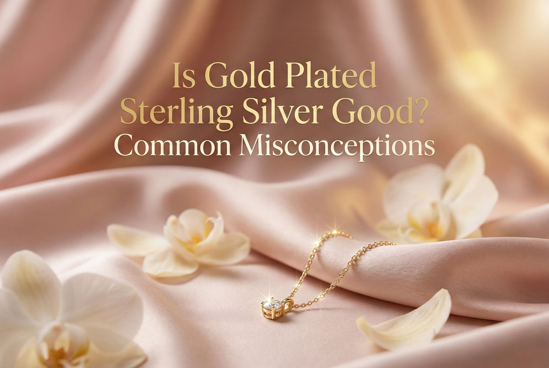 Jewelry banner image with gold-plated silver piece on a soft satin background.