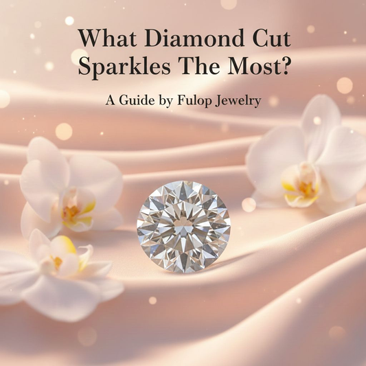 Round brilliant diamond on soft satin fabric illustrating what diamond cut sparkles the most